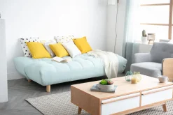 Canapé convertible scandinave en tissu menthe à l'eau et bois clair YUMI