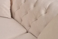 Canapé 2 places capitonné en tissu beige et bois clair MONTAIGNE
