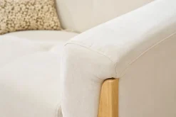 Canapé scandinave 2 places en tissu effet velours blanc cassé et bois clair FJORD