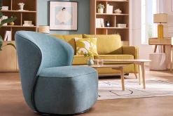 Fauteuil design pivotant en tissu vert de gris AMBER