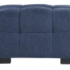 Pouf repose-pieds design en tissu effet velours texturé bleu foncé CORTO