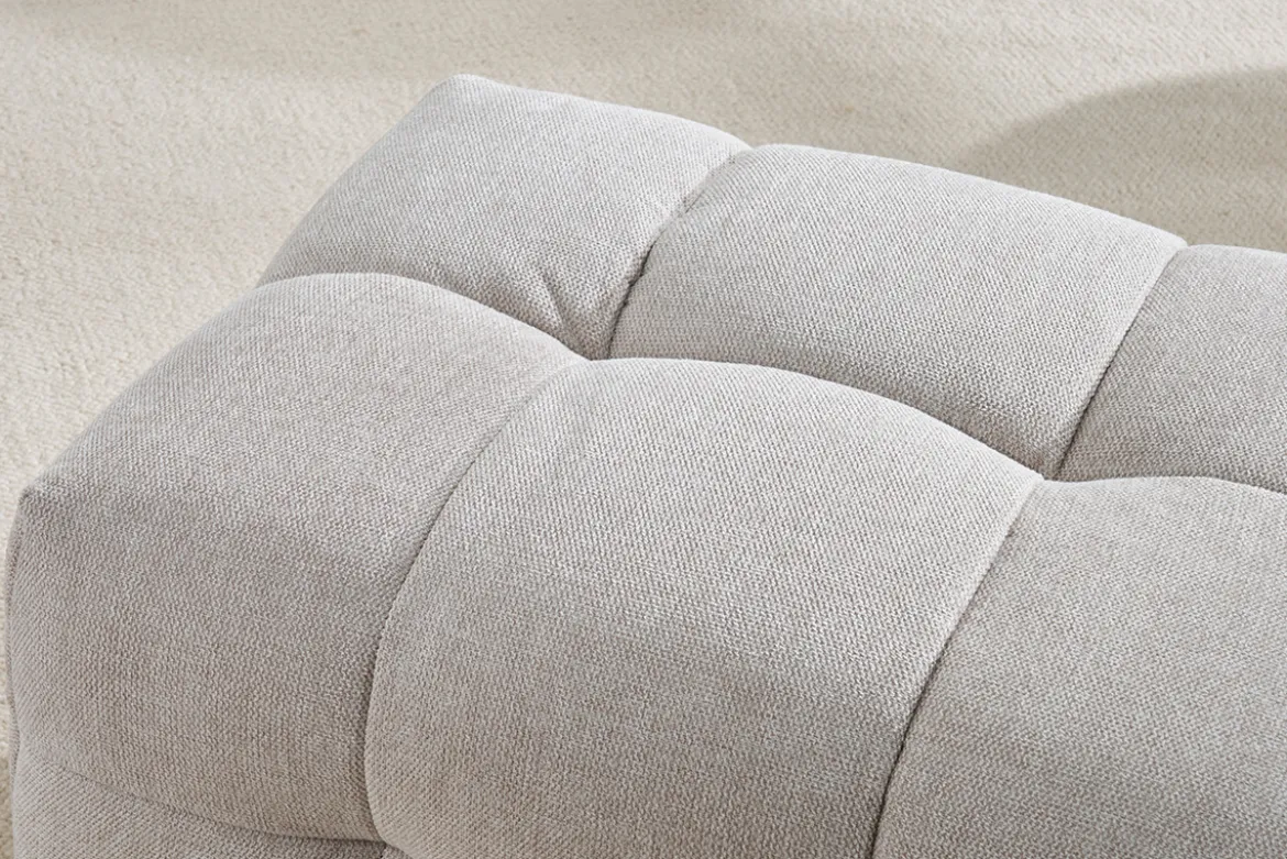 Pouf repose-pieds design en tissu effet velours texturé beige CORTO