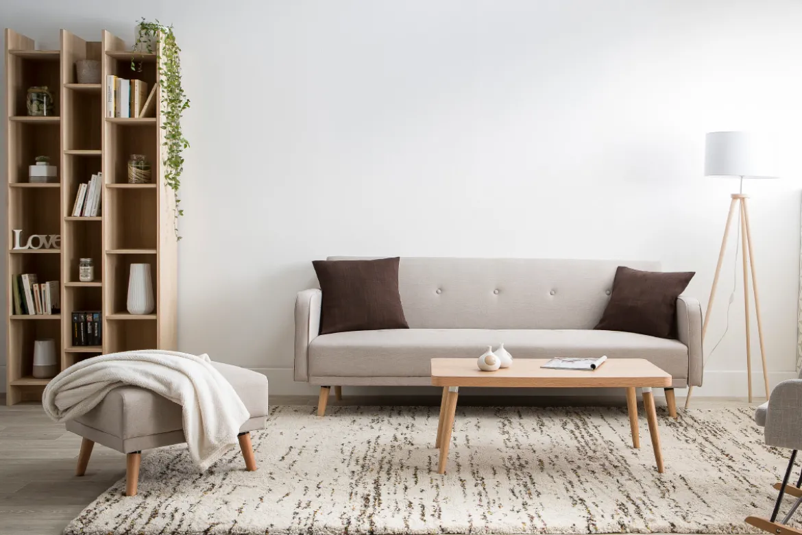 Pouf repose-pieds scandinave en tissu bleu canard et bois clair ULLA