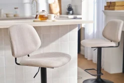 Tabourets de bar relevables design en tissu effet velours beige et métal noir BARNET (lot de 2)