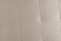 Tête de lit capitonnée en tissu velours taupe L140 cm HALCIONA